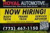 FILE - A now hiring sign is seen in front of an auto body shop in Chicago, June 25, 2026. (AP Photo/Nam Y. Huh, file)