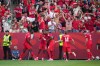 Canada's Cyle Larin (9), Ali Ahmed (20), Promise Akinpelu (24), Jacob Shaffelburg (14) and Alistair Johnston (2) celebrate Larin's goal during the second half of a World Cup Group B soccer match against Bosnia-Herzegovina, in Toronto, on Friday, June 12, 2026. THE CANADIAN PRESS/Nathan Denette