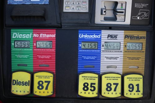 The per-gallon price is displayed electronically over the various grades of fuel available from a pump at a QT gasoline station Thursday, July 30, 2026, in Greenwood Village, Colo. (AP Photo/David Zalubowski)