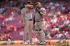 Baltimore Orioles pitcher Kyle Bradish, left, and catcher Adley Rutschman, right, talk on the mound during the eighth inning of a baseball game against the Cincinnati Reds in Cincinnati, Sunday, July 5, 2026. (AP Photo/Carolyn Kaster)