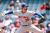 FILE - New York Mets pitcher Clay Holmes throws to a Los Angeles Angels batter during the first inning of a baseball game, May 3, 2026, in Anaheim, Calif. (AP Photo/Jessie Alcheh, File)