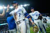 Kansas City Royals' Bobby Witt Jr. (7) celebrates with teamates after their baseball game against the Minnesota Twins, Tuesday, Aug. 4, {t yr4}, in Kansas City, Mo. (AP Photo/Charlie Riedel)