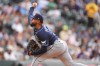 Tampa Bay Rays starting pitcher Freddy Peralta works against the Colorado Rockies in the first inning of a baseball game Tuesday, Aug. 4, 2026, in Denver. (AP Photo/David Zalubowski)