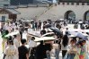 Visitors hold umbrellas to avoid sunshine at the Gyeongbok Palace in Seoul, South Korea, Wednesday, Aug. 5, 2026. (AP Photo/Ahn Young-joon)