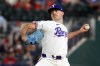 Texas Rangers pitcher Cody Bradford delivers a pitch against the San Francisco Giants in the first inning of a baseball game in Arlington, Texas, Wednesday, Aug. 5, 2026. (AP Photo/ Richard W. Rodriguez)