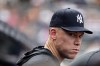 New York Yankees' Aaron Judge looks on in the ninth inning during the first baseball game of a doubleheader against the Pittsburgh Pirates, Wednesday, July 22, 2026, in New York. (AP Photo/Adam Hunger)