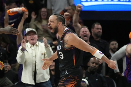 FILE - Phoenix Suns forward Dillon Brooks celebrates his score and being fouled during the second half of Game 4 in a first-round NBA playoffs basketball series against the Oklahoma City Thunder, Monday, April 27, 2026, in Phoenix. (AP Photo/Ross D. Franklin,File)