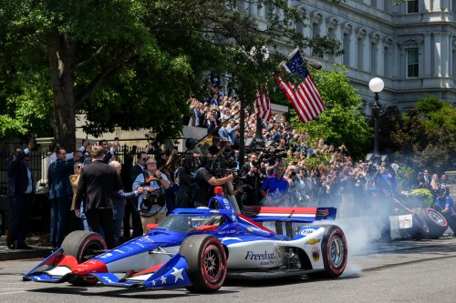 IndyCar Series driver David Malukas drives a race car down West Executive Drive during an event with President Donald Trump to promote the upcoming Freedom 250 Grand Prix auto race, Monday, July 13, 2026, at the White House in Washington. (AP Photo/Julia Demaree Nikhinson)