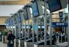 A traveller tries to check in for a cancelled WestJet flight at Vancouver International Airport in Richmond, B.C., on Sunday, Aug. 2, 2026. THE CANADIAN PRESS/Ethan Cairns