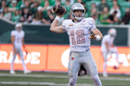 BC Lions quarterback Nathan Rourke (12) lines up a pass during second half CFL football action in Regina on Saturday, June 13, 2026. THE CANADIAN PRESS/Kayle Neis