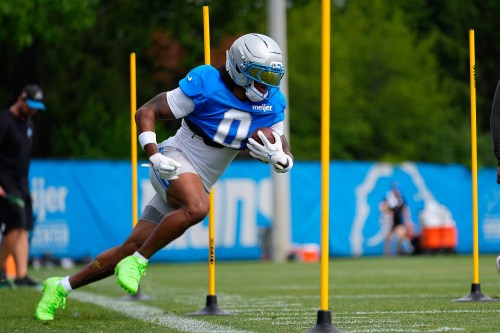 Detroit Lins running back Jahmyr Gibbs runs a drill during practice at the NFL football team's training camp, in Allen Park, Mich., Friday, Aug. 7, 2026. (AP Photo/Paul Sancya)