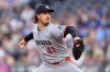Minnesota Twins starting pitcher Joe Ryan throws during the first inning of a baseball game against the Kansas City Royals, Tuesday, Aug. 4, 2026, in Kansas City, Mo. (AP Photo/Charlie Riedel)