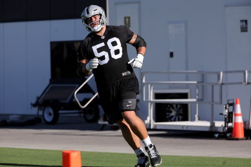 Las Vegas Raiders guard Jackson Powers-Johnson (58) participates in a drill during practice at the team's NFL football training camp, Thursday, July 30, 2026, in Henderson, Nev. (AP Photo/Ian Maule)