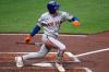 New York Mets' Carson Benge singles off Pittsburgh Pirates pitcher Carmen Mlodzinski, driving in a run, during the third inning of a baseball game in Pittsburgh, Friday, Aug. 7, 2026. (AP Photo/Gene J. Puskar)