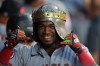 Cleveland Guardians' Angel Martínez celebrates in the dugout after his grand slam during the fifth inning of a baseball game against the Chicago White Sox, Friday, Aug. 7, 2026, in Chicago. (AP Photo/Melissa Tamez)