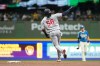 Minnesota Twins' Josh Bell gestures as he rounds the bases after hitting a two-run home run during the third inning of a baseball game against the Milwaukee Brewers, Friday, Aug. 7, 2026, in Milwaukee. (AP Photo/Aaron Gash)