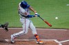 New York Mets' Marcus Semien hits a three-run home run off Pittsburgh Pirates pitcher Carmen Mlodzinski during the third inning of a baseball game in Pittsburgh, Friday, Aug. 7, 2026. (AP Photo/Gene J. Puskar)