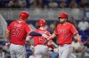 Los Angeles Angels' Nolan Schanuel (18) celebrates after hitting a two-run home that also scored Mike Trout, during the seventh inning of a baseball game against the Miami Marlins, Friday, Aug. 7, 2026, in Miami. (AP Photo/Rebecca Blackwell)