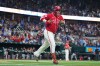 Texas Rangers designated hitter Joc Pederson celebrates after his two-run home run that also scored Elias Díaz during the sixth inning of a baseball game against the Baltimore Orioles, Friday, Aug. 7, 2026, in Arlington, Texas. (AP Photo/LM Otero)