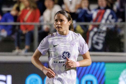 FILE - Racing Louisville FC Emma Sears (13) runs down the field during an NWSL soccer match, Saturday, March 14, 2026, in Cary, N.C. (AP Photo/Ben McKeown,File)