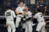 New York Yankees' Ryan McMahon, center, celebrates with Heliot Ramos, right, Ben Rice, second from left, and Luis García Jr. after a baseball game against the Atlanta Braves Saturday, Aug. 8, 2026, in New York. (AP Photo/Frank Franklin II)