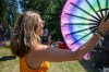 BROOK JONES/FREE PRESS
Folk Fest goer Ayla Prandzioch, 35, who is from Winnipeg, tries to keep cool with a hand fan while watching Yagódy perfrom on the Snowberry Field Stage on an extremely hot day at the 51st edition of the Winnipeg Folk Festival at Birds Hill Provincial Park in Manitoba on Sunday, July 12, 2026.