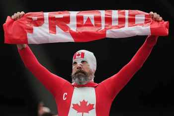 A fan of Canada waits for the start of the World Cup round of 32 soccer match between South Africa and Canada in Inglewood, Calif., near Los Angeles, Sunday, June 28, 2026. (Andre Penner / The Associated Press files)