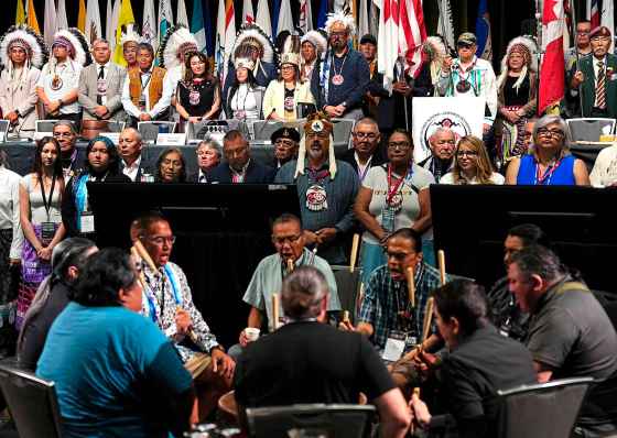 Regional Chiefs and AFN National Chief Cindy Woodhouse Nepinak listen as the SpiritWolf Singers sing during the Grand Entry, at the National Chief of the Assembly of First Nations 2026 Annual General Assembly, in Ottawa, on Tuesday. (Justin Tang / The Canadian Press)