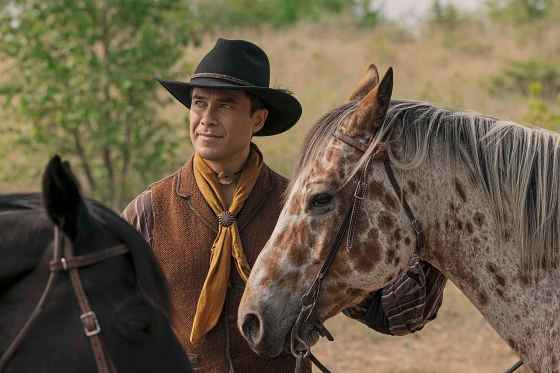 Meegwun Fairbrother plays William Mitchell in a scene from Netflix's Little House on the Prairie, which debuts Thursday. Mitchell is a member of the Osage Nation who acts as a bridge between the Indigenous community and the settlers who are taking over the land around him. (Handout-Netflix / The Canadian Press)