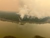 Firefighting crews conduct ignition operations in response to the Fiftynine Creek wildfire northwest of Clinton, B.C., in this handout photo, on Tuesday, July 21, 2026. THE CANADIAN PRESS/Handout, BC Wildfire Service (Mandatory Credit)