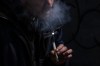 A man smokes crack in a Toronto alley on Friday, April 17, 2026. THE CANADIAN PRESS/Chris Young