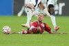 Toronto FC midfielder Niklas Dorsch gets tripped up by New England Revolution midfielder Brooklyn Raines during a Major League Soccer game in Toronto on Aug. 15, 2026. THE CANADIAN PRESS/Nathan Denette