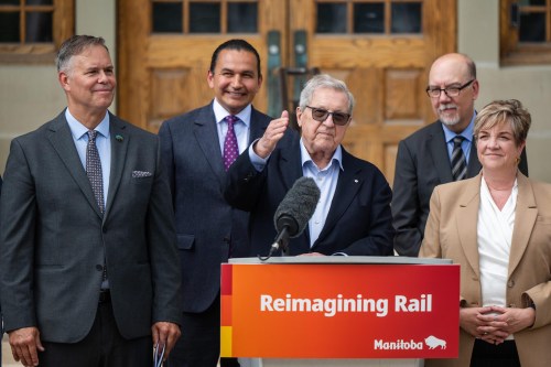 ROBERT LEE / FREE PRESS
Lloyd Axworthy, rail study lead, speaks at the announcement concerning the long-awaited Winnipeg rail relocation at Wesley Hall at the University of Manitoba campus on Wednesday, August 12, 2026.