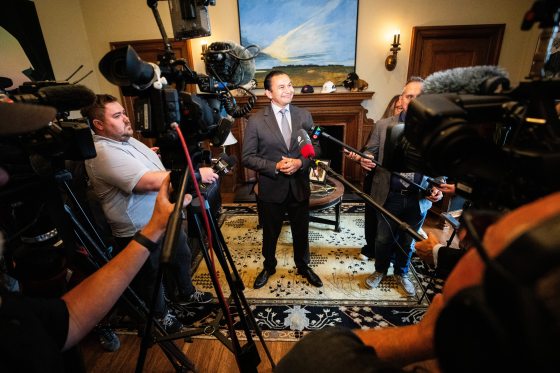 Premier Wab Kinew speaks to media in his office at the Manitoba legislature. (Mikaela MacKenzie / Free Press files)