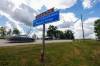 MIKE DEAL / FREE PRESS
                                A highway sign that goes over the Winnipeg River near Lac du Bonnet, named after Susan and Richard Nowell the couple that died in the 2025 wildfires. Returning to the Lac du Bonnet area where wildfires turned lives upside down, caused the deaths of two homeowners and displaced thousands of people fifteen months ago. Reporter: Nicole Buffie 260807 - Friday, August 07, 2026.
