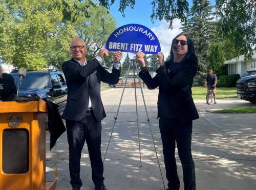 TIAGO RESKO / FREE PRESS
                                Mayor Scott Gillingham unveils Brent Fitz Way with the guest of honour Friday.