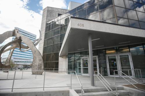 JOHN WOODS / THE CANADIAN PRESS FILES
                                Carlo Deguzman, 50, pleaded guilty in a Winnipeg courtroom Monday to six counts of fraud, forgery and identification theft for offences dating back more than four years.