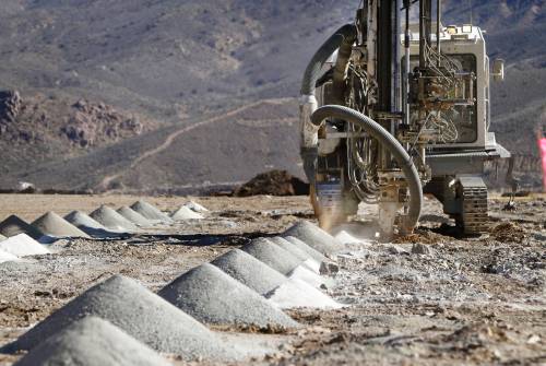 Don Bartletti / Los Angeles Times FILES
                                Blast holes are drilled into a mine for rare earth elements in Mountain Pass, Calif. Rare earth elements are used in the production of everthing from wind turbines and electric vehicles, to weapons of modern warfare.