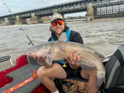 SUPPLIED
                                Winnipeg Goldeyes pitcher Quinn Waterhouse shows off one of the catfish he caught after his host family, Charlie and Cindy Goodman, took him on the Red River in Lockport.