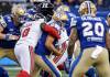 John Woods / THE CANADIAN PRESS
                                Winnipeg Blue Bombers quarterback Zach Collaros gets sacked by Ottawa Redblacks linebacker A.J. Allen, one of four on the evening.