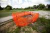 MIKAELA MACKENZIE / FREE PRESS
                                The new sinkhole was caused by intense rainstorms earlier in the summer that created a new area of erosion, city spokeswoman Julie Dooley said.