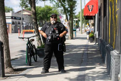 MIKAELA MACKENZIE / FREE PRESS
                                Michael Paille, executive director of the Sargent Business Community, on patrol on Sargent Avenue on Friday, Aug. 21, 2026. For Ѡstory. Free Press 2026