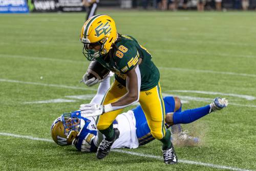 Timothy Matwey / THE CANADIAN PRESS
                                Edmonton Elks receiver T.J. Luther (right) breaks away from Jonathan Moxey&rsquo;s tackle last Friday. The Winnipeg Blue Bombers corner said Monday that little details in tackling were what prevented the club from stopping the Elks&rsquo; game-winning drive.