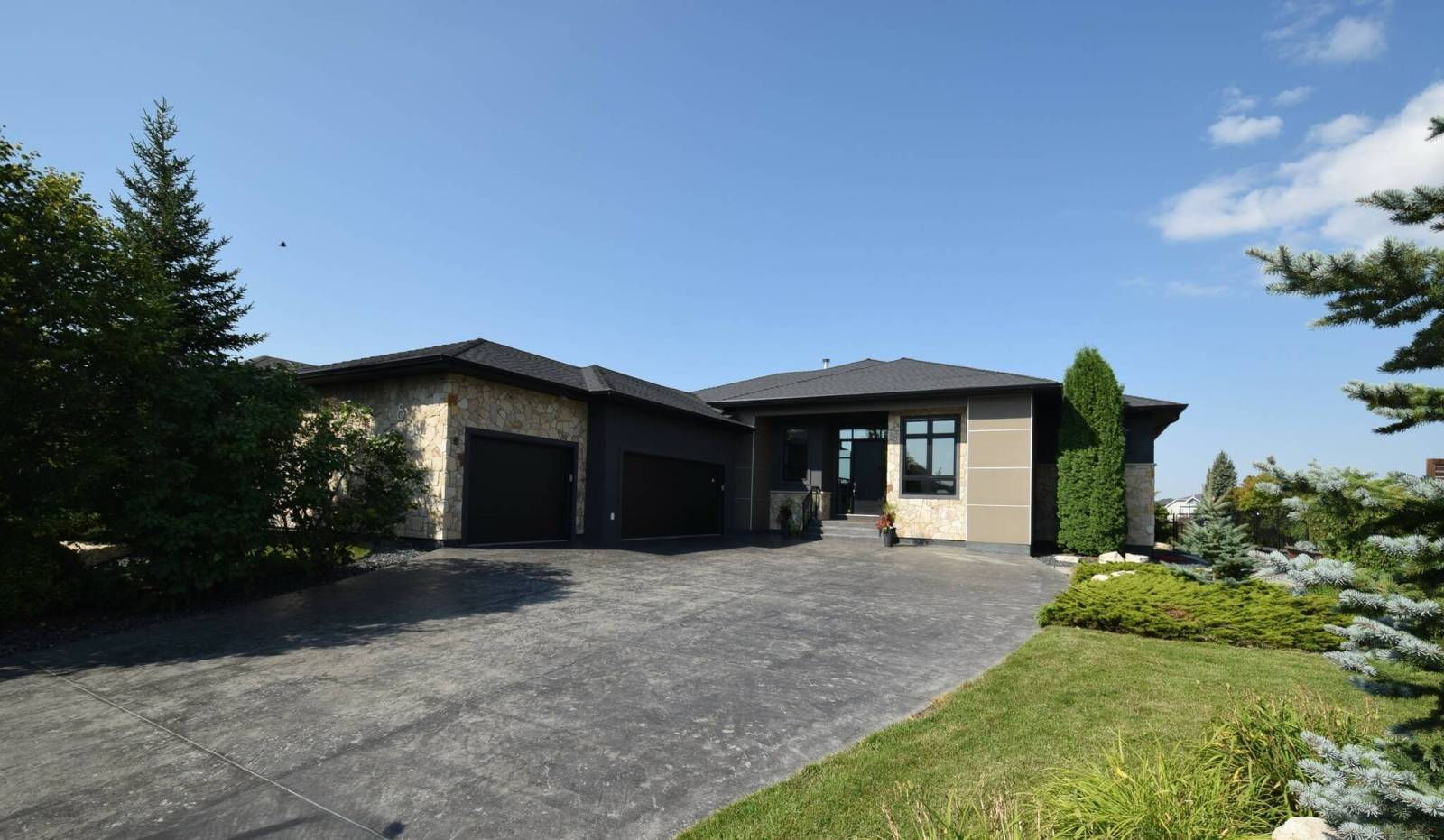 This stunner in Oak Bluff West is move-in ready