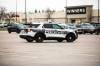 MIKAELA MACKENZIE / FREE PRESS FILES
                                A police car drives through retail parking lots in Unicity on Thursday, Nov. 6, 2025. For retail theft story. Free Press 2025