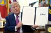The Associated Press
                                U.S. President Donald Trump holds up a signed executive order renaming Lake Ontario as &ldquo;Lake America&rdquo; in the Oval Office of the White House on Thursday. Erasing the Indigenous name for a lake is just another step in Trump&rsquo;s attacks on Indigenous Peoples, Niigaan Sinclair writes.