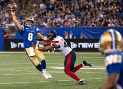ROBERT LEE / FREE PRESS
                                Winnipeg Blue Bombers&rsquo; quarterback Zach Collaros delivers a pass during the first half CFL football action in Winnipeg on Friday.