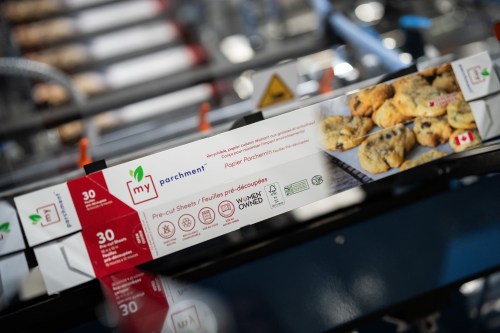 Boxes of parchment paper sit in a machine at aVenco's packaging facility in Bowmanville, Ont, on Monday, August 31, 2026. THE CANADIAN PRESS/Arlyn McAdorey