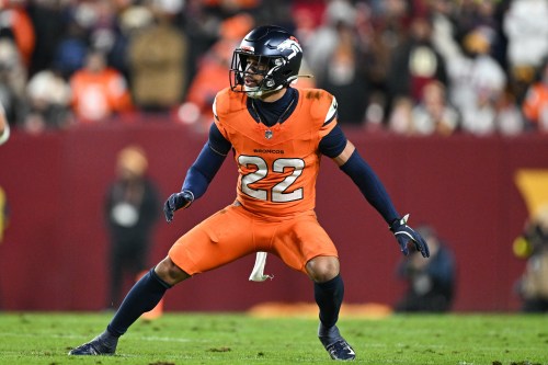 FILE - Denver Broncos safety Brandon Jones (22) defends during the first half of an NFL football game against the Washington Commanders, Nov. 30, 2025, in Landover, Md. (AP Photo/Terrance Williams, File)