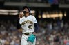 Milwaukee Brewers' Abner Uribe gestures as he walks to the dugout during the seventh inning of a baseball game against the Minnesota Twins, Saturday, Aug. 8, 2026, in Milwaukee. (AP Photo/Aaron Gash)